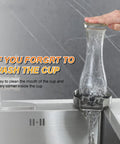 Stainless Steel Glass Rinser With 360 Degree Rotating Spray for Kitchen Sink in action, rinsing a bottle, brushed finish, no fuss cleanup.