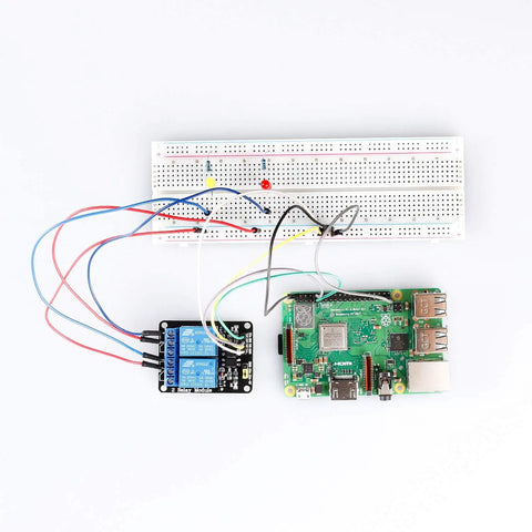 Two Channel 5V Relay Module With Optocoupler Low Level Trigger Expansion Board Plug And Play For Arduino Raspberry Pi ESP32 ESP8266 And Broad Microcontroller Compatibility connected to solderless breadboard and Raspberry Pi