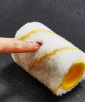 Heavy Duty Paint Edger Roller For Interior Walls Ceilings And Doors Cuts Crisp Lines Hassle Free showing sponge roller with yellow end.