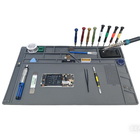 Extra Large Silicone Soldering Mat 21.6 By 13.8 Inches, Heat Resistant Up To 932 Degrees Fahrenheit, with tools placed on mat