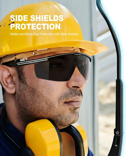Man wearing Anti Fog Safety Glasses With Side Shields UV400 Protection Tough As Nails Eyewear, hard hat, and earmuffs.