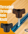 Woodworking T Track Knob Kit 36 Piece Set With 1/4-20 Threads installed in T-slotted miter slot on wood surface