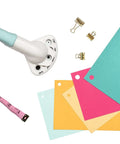 Multi Size Hole Punch For Leather, Paper, Fabric And More Rotates Through Five Hole Sizes shown beside colorful paper cards