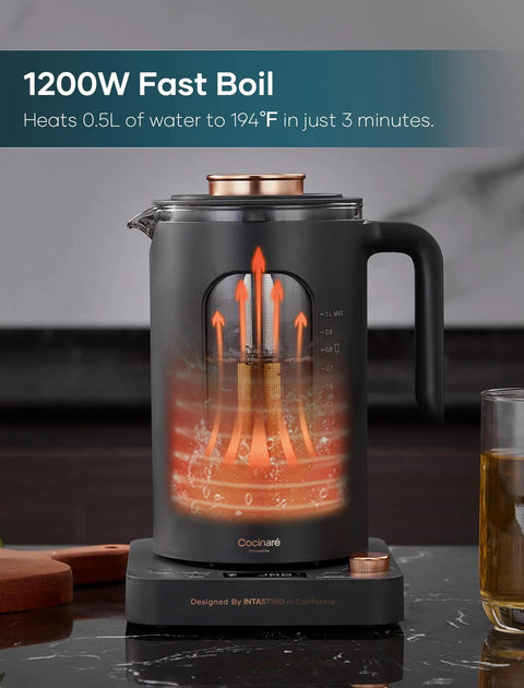Electric Tea Kettle With Tea Infuser, One Degree Fahrenheit Precision, 1200W Rapid Heating, BPA Free Glass, 1 Liter Capacity, No Fuss Clean Up, Dark Gray Finish in kitchen setting.