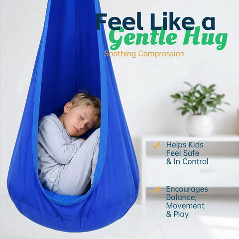 Child resting in blue Indoor Outdoor Sensory Pod Swing Chair For Kids And Adults 72 Inch High 32 Inch Wide Cozy Inflatable Cushion