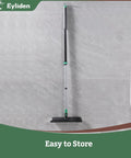 Extra Wide Floor Scrub Brush With Long Telescoping Handle 15 Inch Wide Deck Head 2 In 1 Scrubber Stiff Bristles And Rubber Squeegee For Bathroom Shower Kitchen Patio Garage, standing against a wall.