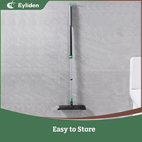 Extra Wide Floor Scrub Brush With Long Telescoping Handle 15 Inch Wide Deck Head 2 In 1 Scrubber Stiff Bristles And Rubber Squeegee For Bathroom Shower Kitchen Patio Garage, standing against a wall.