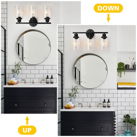 Modern 3 Light Vanity Light Fixture In Black With Clear Glass Shades, Dope Sleek Wall Sconce installed bathroom mirror view