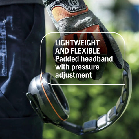 Gloved hand holding Lightweight Headband Ear Protectors With Padded Headband And Clamshell Design 25dB NRR Hearing Protection