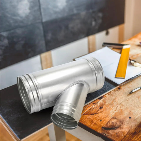 Straight Up Heavy Duty 6 To 4 Inch Branch Y Shaped Ducting Connector Featuring 45 Degree Galvanized Splitter on a wooden surface.