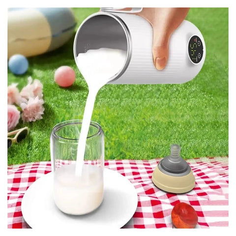Grab And Go Heated Self Stirring Mug Electric Magnetic Mixing Travel Cup pouring milk into a glass outdoors on grass.
