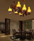 Rustic 6 Light Wooden Glass Barn Chandelier Hanging Ceiling Lamp Fixture Vintage Industrial Bar Pub Restaurant Decor Badass Lighting For A Sick Kickback Lounge Setup With Warm Glow in a dining room setting.
