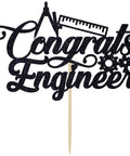 Engineer Graduation Cake Topper For Class Of 2026 featuring black glitter cardstock with engineering symbols on wooden stick.