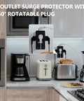 Rock Solid 4 Outlet Surge Protector With 350 Degree Rotating Plug for TV and Fridge, compact design on kitchen counter.