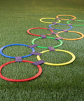 Hopscotch Rings Game Kit With Ten 11 Inch Plastic Rings And Fifteen Connectors for outdoor fun on grass.