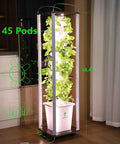 Vertical Hydroponics Tower Garden For Home Growers With 45 Pods, showing tall unit with leafy greens under LED lights.