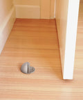 Floor Mounted Door Stops Five Pack Satin Nickel Zinc Heavy Duty With Rubber Cushions And Easy Install Dome Shaped To Protect Walls And Doors 1.75 Inch Diameter By 1.25 Inch High installed on wooden floor
