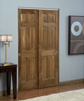Twin Wheel Bypass Sliding Door Hardware Kit For Doors 1 3 8 Inch Thick, 75 Pound Capacity, installed on wooden closet doors.
