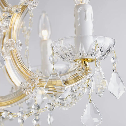 Close-up view of the Gold 5 Light Maria Theresa Crystal Chandelier With Adjustable Chain Up To 52 Inches E12 Bulb Ready LED Compatible Modern Luxury Ceiling Fixture For Bedroom Dining Room Living Room 19 By 19 Inches Lit Glam Glow, showing intricate crystal details and bulb holders.