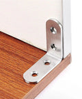 Rock Solid Stainless Steel L Brackets Corner Connectors Pack Of Fifty For Wood Projects DIY Furniture Building Heavy Duty Right Angle Supports Built Like A Tank That Never Breaks A Sweat, showing an L bracket attached to wood.