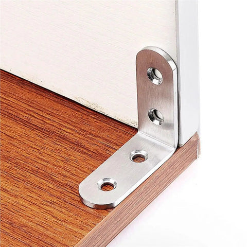 Rock Solid Stainless Steel L Brackets Corner Connectors Pack Of Fifty For Wood Projects DIY Furniture Building Heavy Duty Right Angle Supports Built Like A Tank That Never Breaks A Sweat, showing an L bracket attached to wood.