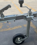 Heavy Duty Swivel Boat Trailer Jack Wheel - Foldable Lift Stand With Rustproof Galvanized Finish, 330 Lb Capacity close-up view with handle and wheel.