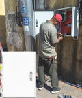 Top Shelf Waterproof EV Charger Box With Lock Outdoor Enclosure Stand, being installed by a worker next to an electrical wall.