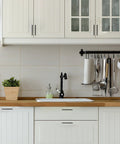 Modern kitchen with 10 Pack 5 Inch Matte Black Cabinet Pulls Zinc Alloy Drawer Handles on white cabinets, 128mm center to center.