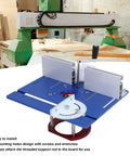 Dead On Aluminum Router Table Insert Plate That Clicks Securely Into Woodworking Rigs Matching Sixty Four To Sixty Five Mm Motors And Dishing Out Fifty One Mm Lift Stroke In Bold Blue on workbench with mounting holes.