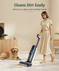 Woman using S5 Replacement Brush Rollers And HEPA Filter Set For Floor One S5 Pro Cordless Wet Dry Vacuum Cleaner on floor with dog