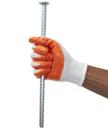 14 Inch Rebar Spikes Kit 1/2 Inch Diameter Pack Of 16 Tough As Nails Galvanized Steel Asphalt Mounting Hardware in orange-gloved hand