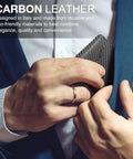 Man placing Slim RFID Blocking Leather Wallet For Men Front Pocket Card Holder With Carbon Fiber Look into suit pocket.