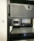 19 Inch Rack Mount Bracket For Climate Controllers Server Cabinet Equipment Stand Heavy Duty Layout Tray mounted in a server cabinet.