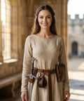 Woman in medieval dress wearing a Medieval Belt Pouch Set With Detachable Belt And Leather Bracers Coin Bag Hook Strap