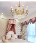 Retro Brass Pendant Light,Villa Living Room Luxury Decorative Chandelier in a bedroom with pink decor, featuring eight lights and crystals.