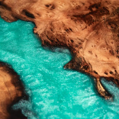 Close-up view of the wood and turquoise resin detail on the 16 Inch Turquoise Epoxy Resin Lazy Susan Wood Turntable Organizer.