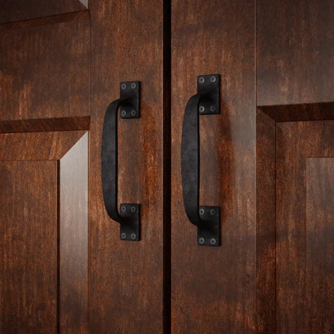 Dang Sturdy Six Inch Black Wrought Iron Cup Bin Pull Cabinet Handles With Rust Proof Powder Coat Finish on wooden doors.