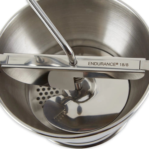 Mini Stainless Steel Food Mill With Transferless Design For Baby Food Sauces And Purees Fits On Wide Mouth Jars 5.5 Inch Diameter A Practical Kitchen Tool For Everyday Cooking And A Go To Pick showing close-up of milling mechanism.