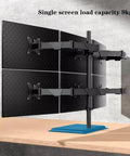 Dual Monitor Arm Mount With Smooth As Butter Articulation Full Extension Swivel Tilt Rotation Height Adjustable Heavy Duty Steel Desk Stand Ergonomic Desktop Setup For 17 To 32 Inch Screens Built Like A Tank with four arms mounted on a desk, showcasing its load capacity.