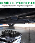Black solid rubber auto lift pad with grid-top on a hydraulic jack under a car