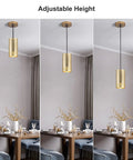 Gold Pendant Light Fixtures, Adjustable Modern Industrial Metal Lighting for dining table with ambient glow and clean lines.