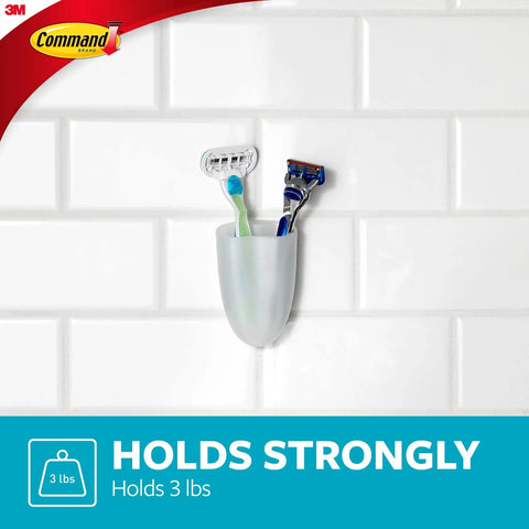 Clear Frosted Bath Razor Holder with Water Resistant Strip holding razors and toothbrush on tiled shower wall
