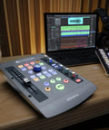 IoStation 24C 2x2 USB Audio Interface and Production Controller With 192 KHz Conversion on a studio desk setup