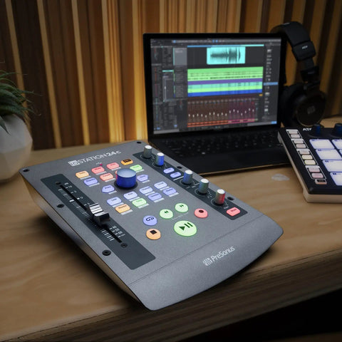 IoStation 24C 2x2 USB Audio Interface and Production Controller With 192 KHz Conversion on a studio desk setup