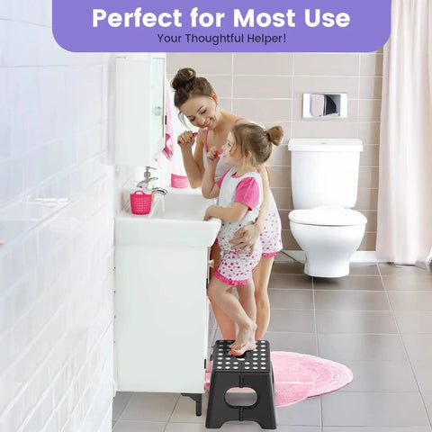 Child using Folding Step Stool Nine Inch Holds Up To 600 Lb With Non Slip Surface And Carry Handle in bathroom