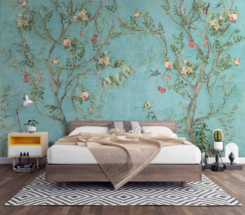 Chinoiserie Floral Wallpaper With Birds In Turquoise Backdrop behind bed, removable peel and stick, ideal for living rooms, 100x150.