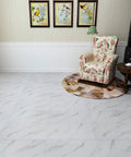 Room with floral armchair on Peel And Stick 12x24 White Marble Vinyl Floor Tile For Bathrooms And Kitchens Waterproof Self Adhesive Removable Flooring 12 Pack Covers 24 Sq Ft Easy Install Garage Backsplash