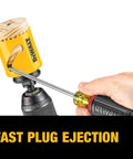 Close-up of DeWALT bi-metal hole saw on a drill, yellow housing with wood plug inside