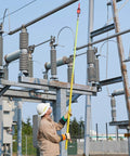 Technician using high voltage detector kit for field techs 30 V to 122 kV AC intrinsically safe pro grade MSHA certified on power lines.