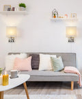 Living room with Slick Dual USB Wall Sconces Set For Bedroom Plug In Bedside Lights With USB Ports And Outlets above sofa